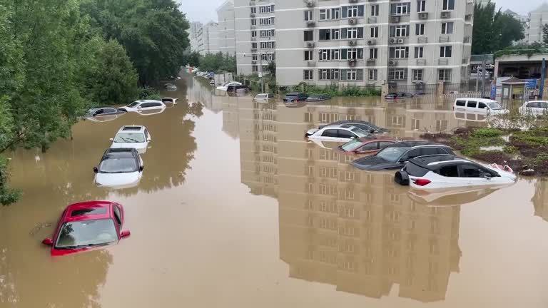 جان باختن 50 تن در اثر بارش شدید باران در چین 3